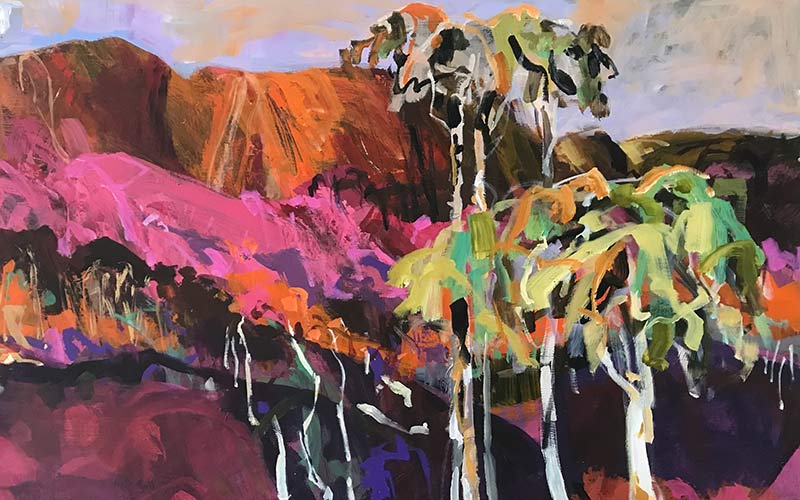 moments-in-time-mike-staniford A colourful painting by an Australian artist shows a landscape with vibrant, abstract mountains in orange and pink hues, green and yellow trees in the foreground, and a cloudy sky with purple and grey tones.